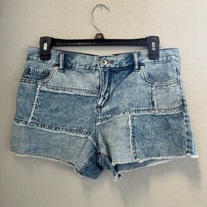 Sugar and Jade size 14 Jean shorts.​ medium wash with light wash blend. Raw hem​